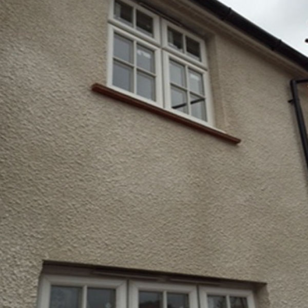 Using a render pump to achieve a roughcast render finish er UK