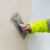 Using a decorative finish over existing render