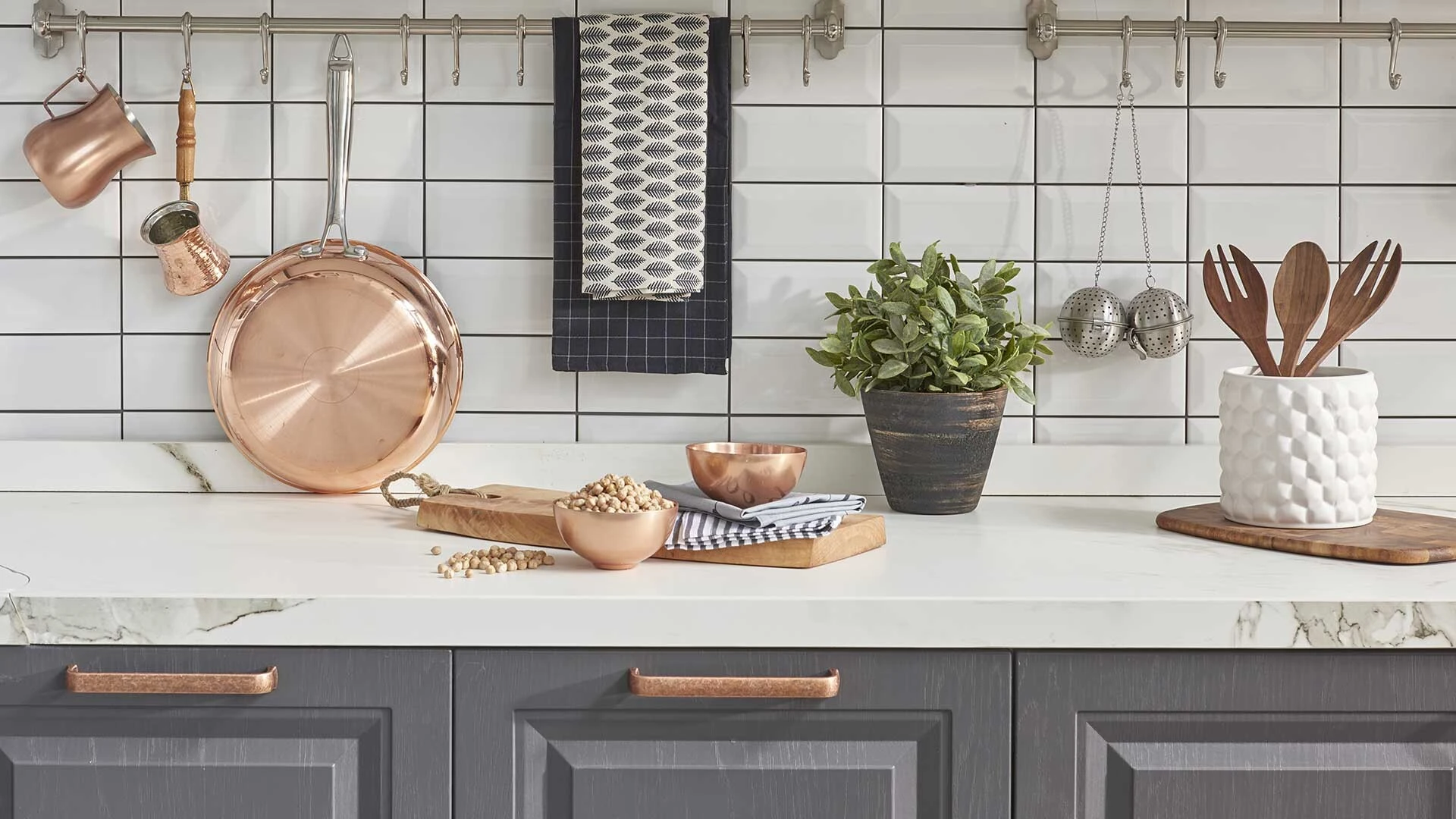 Grey kitchen with copper accents