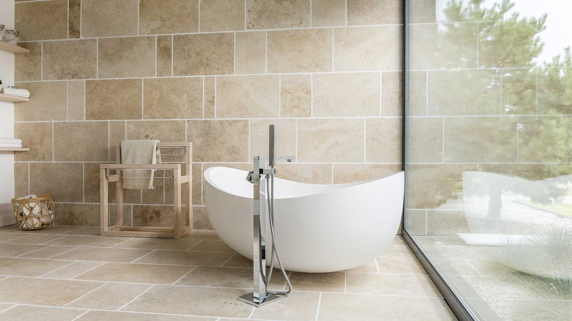 Neutral luxurious tiled bathroom 