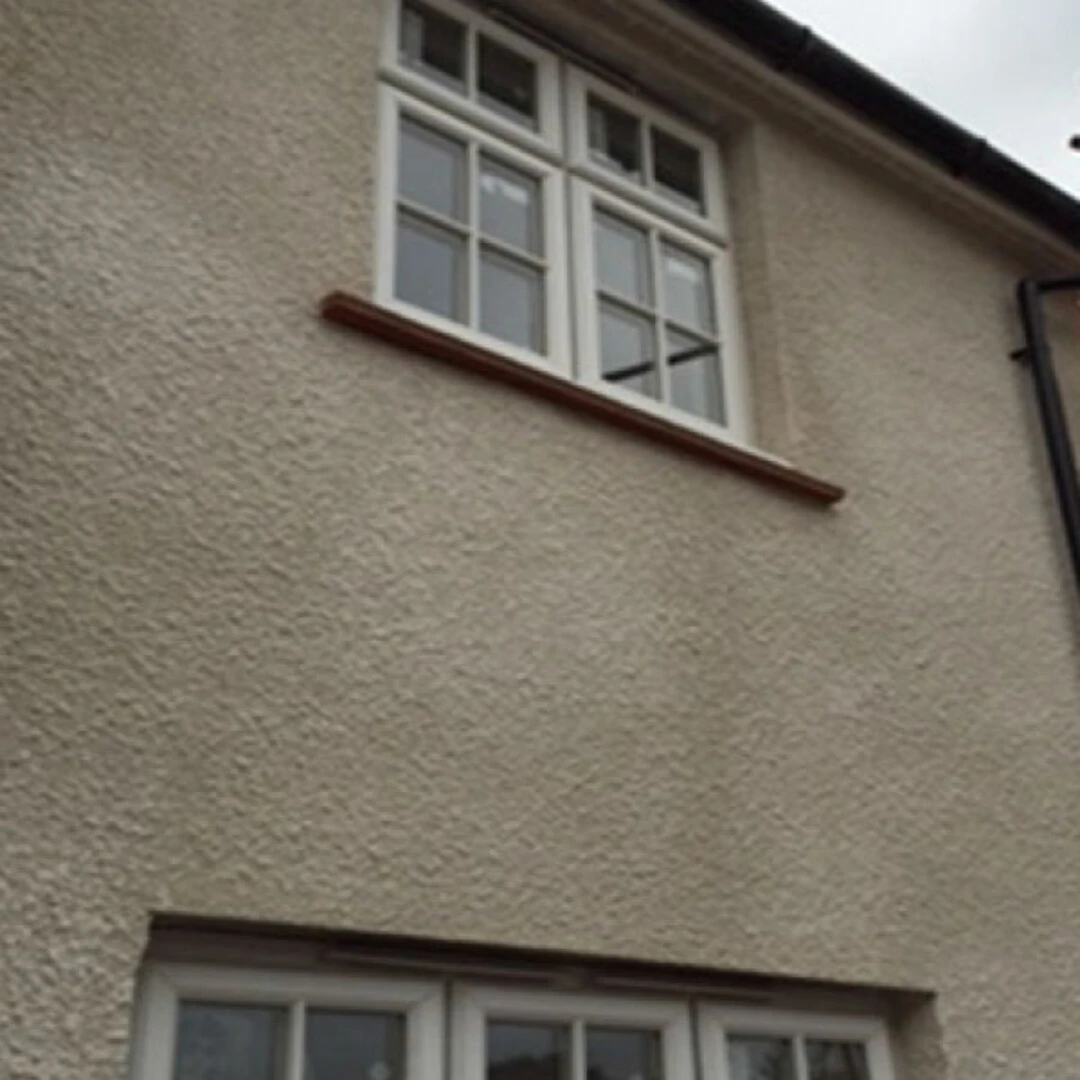Use a render pump to achieve a roughcast render finish
