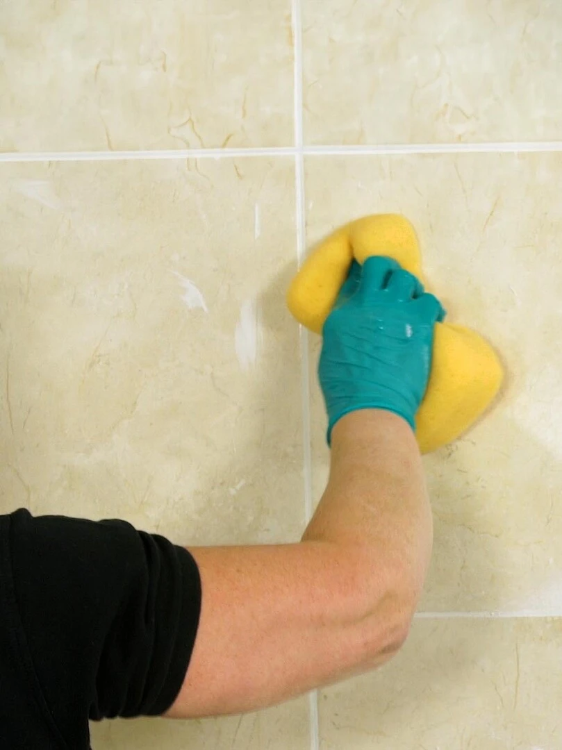 Cleaning grout from tiles