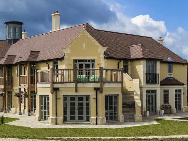 Arts and crafts newbuild finished in weberpral M monocouche render from Weber